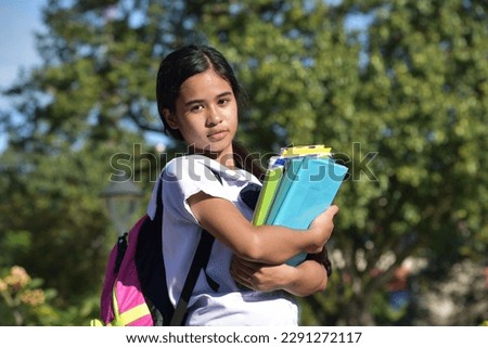 An Unemotional Youthful Girl Student Royalty-Free Stock Photo #2291272117