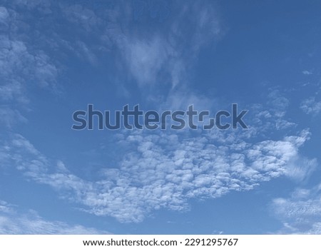 Altocumulus clouds are full of streaks of beautiful usually appear between lower stratus clouds and higher cirrus clouds at Bangkok,Thailand.no focus Royalty-Free Stock Photo #2291295767
