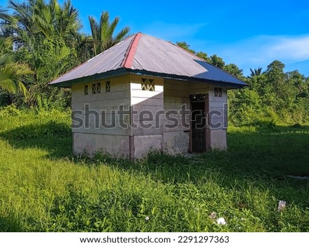 Existing toilet building in a rural school.