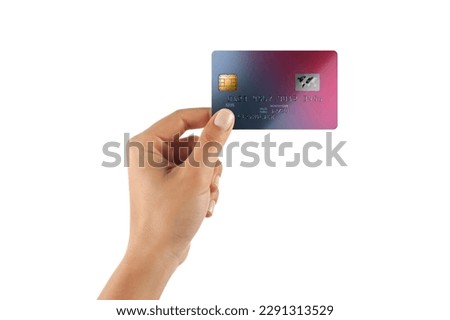 Business woman hand holds a credit card