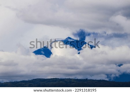 Mount Kerinci (Gunung Kerinci) is the highest mountain in Sumatra, the highest volcano and the highest peak in Indonesia with an altitude of 3805 masl, located in the Kerinci Seblat National Park area Royalty-Free Stock Photo #2291318195