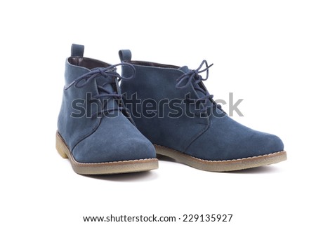 pair of blue boots on white background