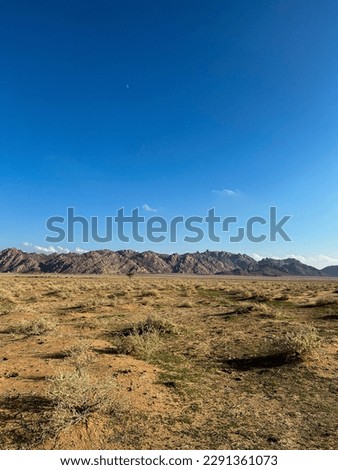 Aja Mountain is interspersed with many reefs, and inside it are some small villages, eyes and palms. This mountain is interspersed with many reefs, and inside it are some small villages,eyes and palms Royalty-Free Stock Photo #2291361073