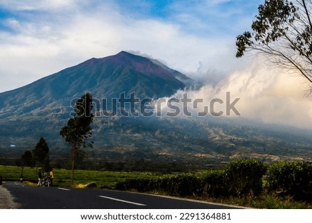 Mount Kerinci (Gunung Kerinci) is the highest mountain in Sumatra, the highest volcano and the highest peak in Indonesia with an altitude of 3805 masl, located in the Kerinci Seblat National Park area Royalty-Free Stock Photo #2291364881