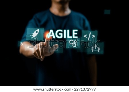 The agile development methodology is presented on a virtual screen, reflecting its use as a technology concept.