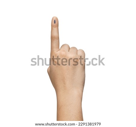 Female Indian Voter Hand with a voting sign or ink pointing vote for India on background with copy space election commission of India Royalty-Free Stock Photo #2291381979