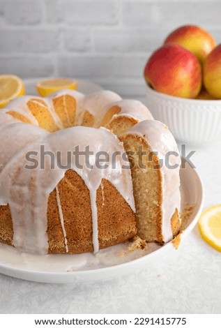 Bundt cake with lemon glaze on kitchen counter