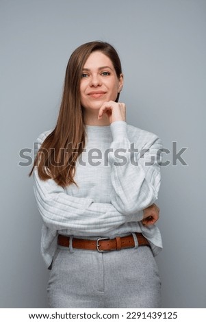 Portrait of happy woman in casual light clothing. 