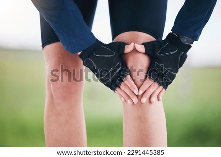 Fitness, knee pain and sports injury with woman in nature for running, training and workout. Emergency, accident and joint inflammation with female runner in outdoors for muscle, strain and bruise Royalty-Free Stock Photo #2291445385