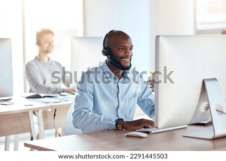 Call center, computer and online with black man in office for customer service, technical support and advice. Technology, contact us and communication with employee operator in help desk agency