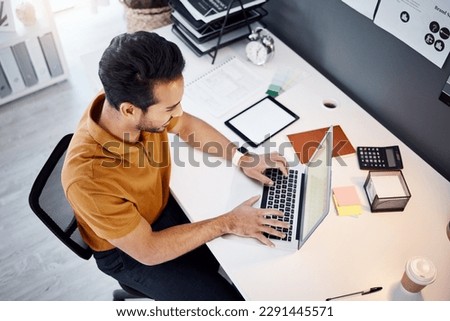 Laptop, online project or business man typing research for multimedia design, illustration process or graphic development. Research data, top view and male designer working on creative web graphic