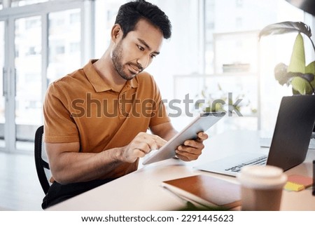 Tablet, office focus and man reading web research, customer experience feedback and online app analysis. Multimedia project, professional male editor and agent working on editing social media post