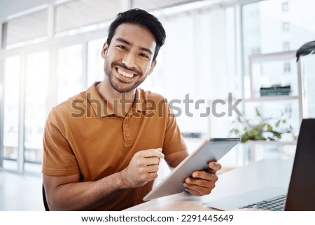 Tablet, office portrait and happy man typing web research, customer experience review and search online app. Multimedia application, male editor and management agent working on editing social media