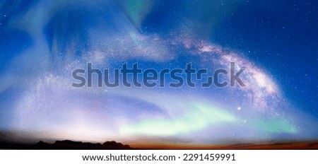 Our galaxy is Milky way spiral galaxy with aurora borealis Royalty-Free Stock Photo #2291459991