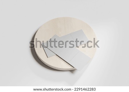 ticket mockup over white floor and table