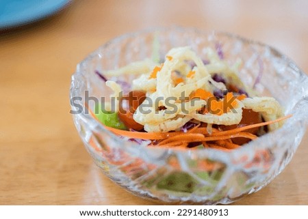 Shirauo Salad or Silverfish Salad in a bowl. Selcetive focus.