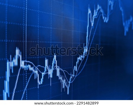Professional market analysis. Coin Bitcoin, ETH and XRP on background cryptocurrency trading chart on computer screen. Stock Market Chart on Blue Background