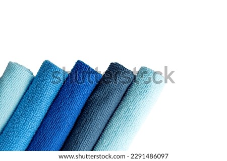A row of colorful microfiber cloths for housekeeping and cleaning