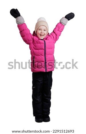 Portrait of happy little girl in winter wear isolated on white background
