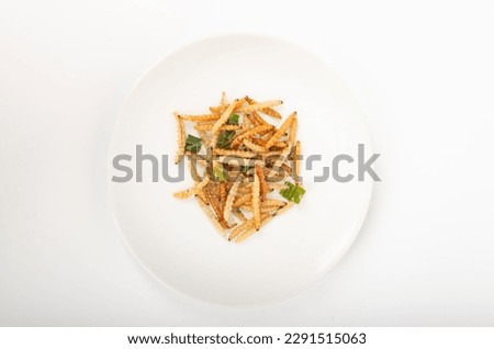 Fried bamboo worms are the protein source of the future. Royalty-Free Stock Photo #2291515063