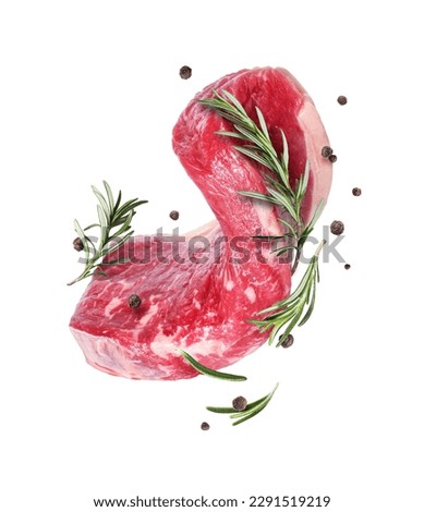 Raw beef steak with rosemary and allspice isolated on a white background Royalty-Free Stock Photo #2291519219