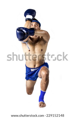 Thai boxer with thai boxing action, isolated on white background