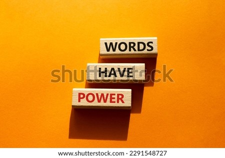 Words have power symbol. Wooden blocks with words Words have power. Beautiful orange background. Business and Words have power concept. Copy space.