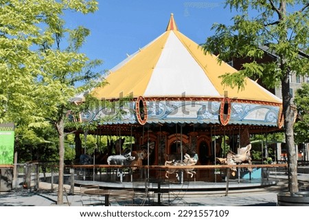 A close up, isolated view of the Greenway Carousel. This slow moving ride is perfect for the children and has animals native to the area to ride on.