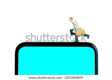 Miniature people toy figure photography. A businessman wearing coat running above blue screen smartphone. Isolated on white background. Image photo