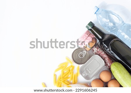 Top view of food stocks, set of grocery products from canned foo
