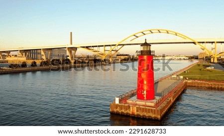 Aerial view of Pierhead Lighthouse, Lake Michigan Pier, Hoan Memorial Bridge in Milwaukee, Wisconsin, USA  at sunrise 
