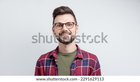 Closeup photo of young attractive handsome positive bearded man wear casual shirt