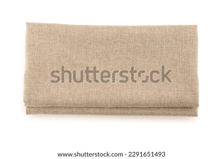 Folded fabric napkins isolated on white background