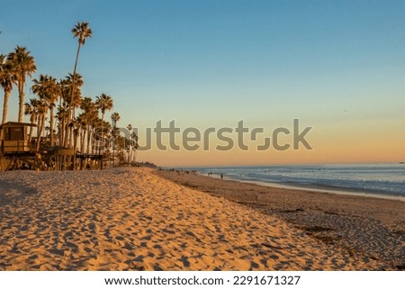 Sunset over the San Clemente pier, Orange County, California, USA. The beautiful seaside resort town of San Clemente, Orange County, California, USA.  Royalty-Free Stock Photo #2291671327