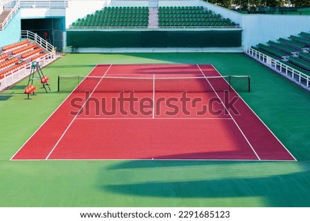Tennis court. View of a tennis court with artificial turf Royalty-Free Stock Photo #2291685123