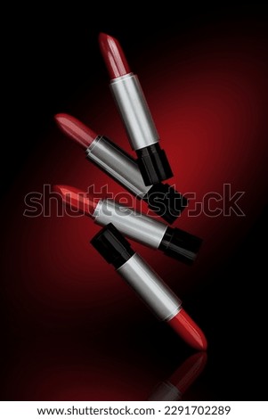 Lipstick makeup concept. Set of red, pink, berry, magenta, purple color lipsticks. Make-up Visage accessories. Background for design with empty copy space