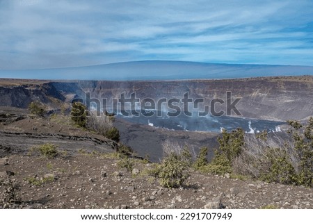 View of the caldera of the Kilauea volcano, the most active of the five volcanoes that form Hawaii island, Hawaii Volcanoes National Park, USA Royalty-Free Stock Photo #2291707949