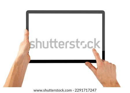 tablet ipad in a hand on the white backgrounds Royalty-Free Stock Photo #2291717247