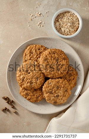 Oatmeal healthy cookies with peanut butter and chocolate chips in a plate. Top view.