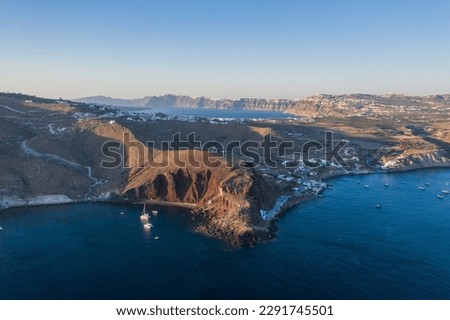 The red beach with the southern coast of the island of Santorini in the Cyclades in Greece