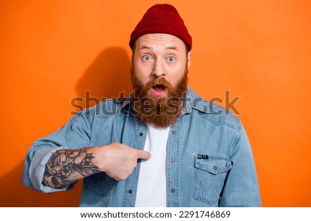 Photo of impressed cool man open mouth point finger self himself isolated on orange color background