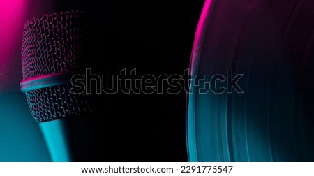 musical abstract background with vinyl record and microphone