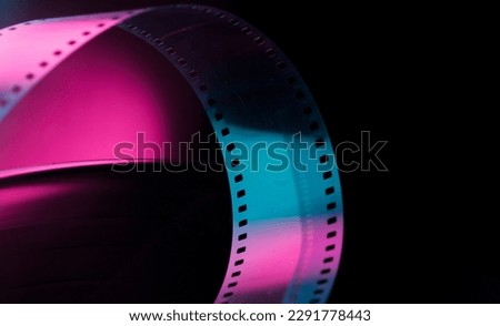 abstract background with film strip. background for film production film festival concept Royalty-Free Stock Photo #2291778443