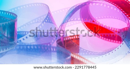 abstract background with film strip. background for film production film festival concept Royalty-Free Stock Photo #2291778445