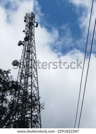 telecommunication radio transmitting tower with BTS and microwave antennas