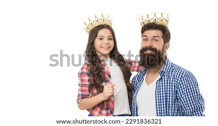 Bearded man proud of his daughter. Play game with daughter. Fatherhood concept. Fun with daughter. Royal family. Man golden crown and little girl kid. King and princess. Happy family white background