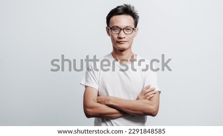 Young confident asian chinese young man checking hair style and dandruff. Royalty-Free Stock Photo #2291848585