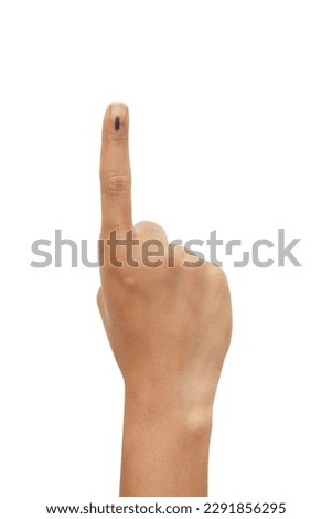Female Indian Voter Hand with a voting sign or ink pointing vote for India on background with copy space election commission of India Royalty-Free Stock Photo #2291856295
