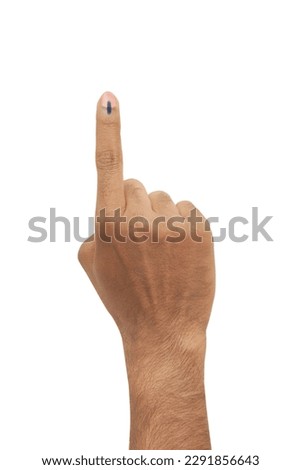 male Indian Voter Hand with a voting sign or ink pointing vote for India on background with copy space election commission of India         Royalty-Free Stock Photo #2291856643