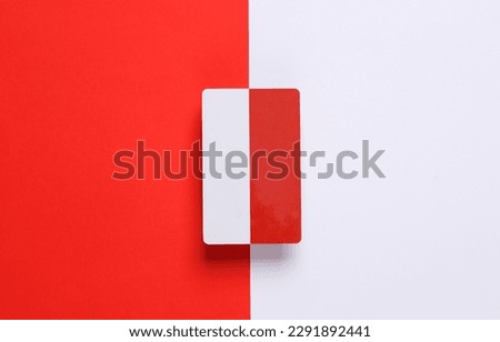 Bank or discount plastic card two-color on a red-white background